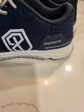Born Primitive Navy Blue Athletic Shoe with White Accents